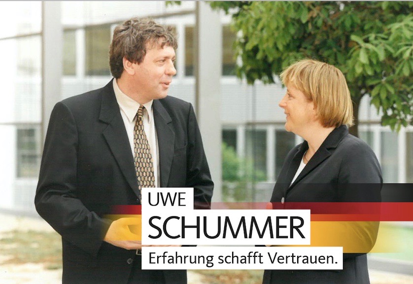Uwe Schummer im Gespräch mit Bundeskanzlerin Angela Merkel.